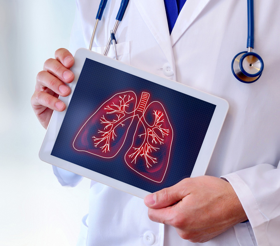 Medical Doctor showing lungs on ipad